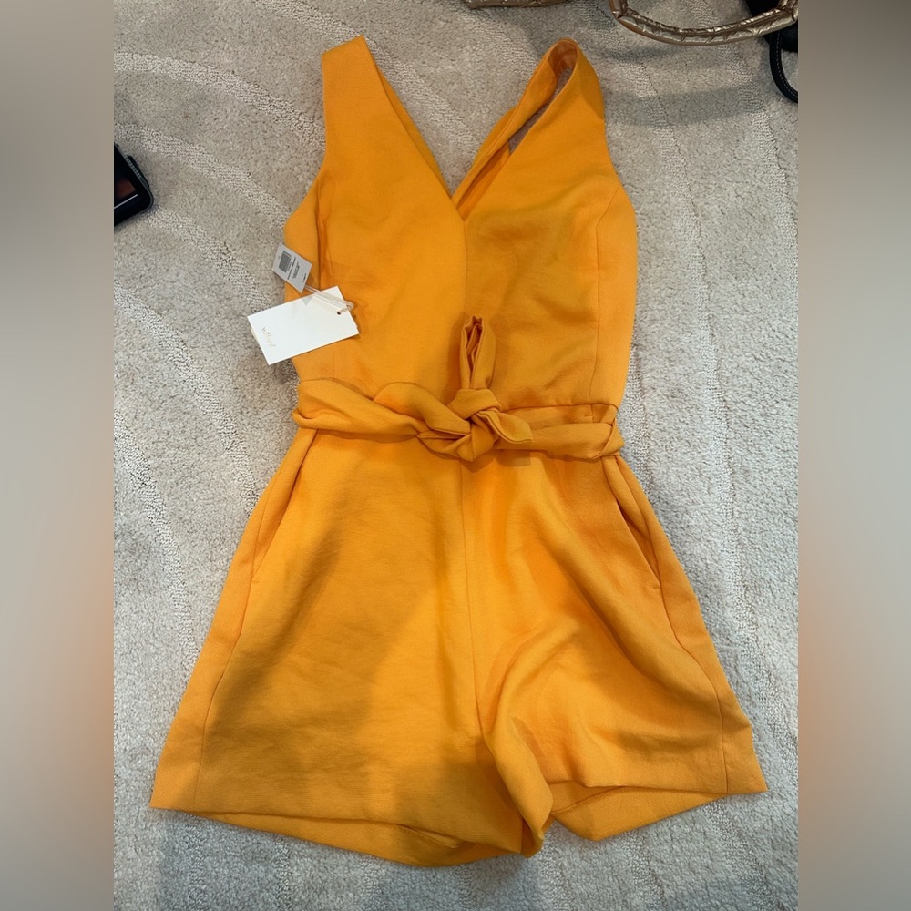 new with Tags Aritzia Wilfred Ecoulement Romper. Color: Tuscan Sun. Size 4